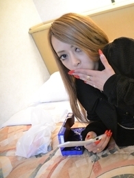 Yui Nagahara with long, blonde hair and perfect nails sucks cock.