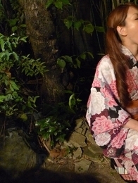 Kana Suzuki in kimono sucks cock outdoors