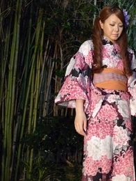Kana Suzuki in kimono sucks cock outdoors