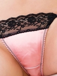 Risa Aika with sexy smile has naughty behind in short skirt