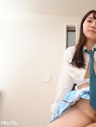 Mio Ito shows us her sexy legs and hairy pussy in her uniform