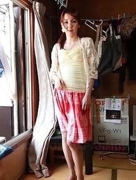 Asian Chika Sasaki strips to show round boobs