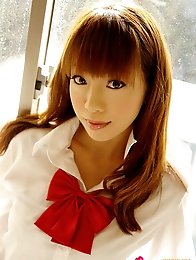 Captivating asian school girl seduces with her plump boobs