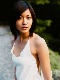 Lovely asian hottie is enthralling in her little bikini