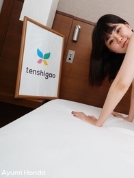 Teen Ayumi Honda is posing naked on a bed in a hotel room